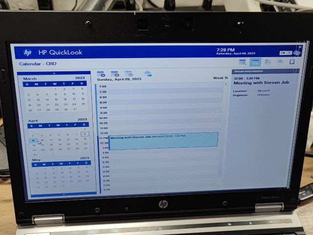A laptop screen with the same "HP QuickLook" banner, but now the rest of the screen displays a clean, businesslike blue-on-white calendar view. There are icons to add and delete calendar events, and one event exists, labeled "Meeting with Steven Job." A sidebar displays calendars spanning three months, and another sidebar displays details on the current event