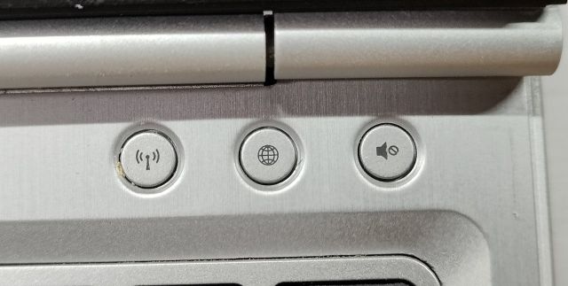Photo of the Quickweb button on an HP laptop